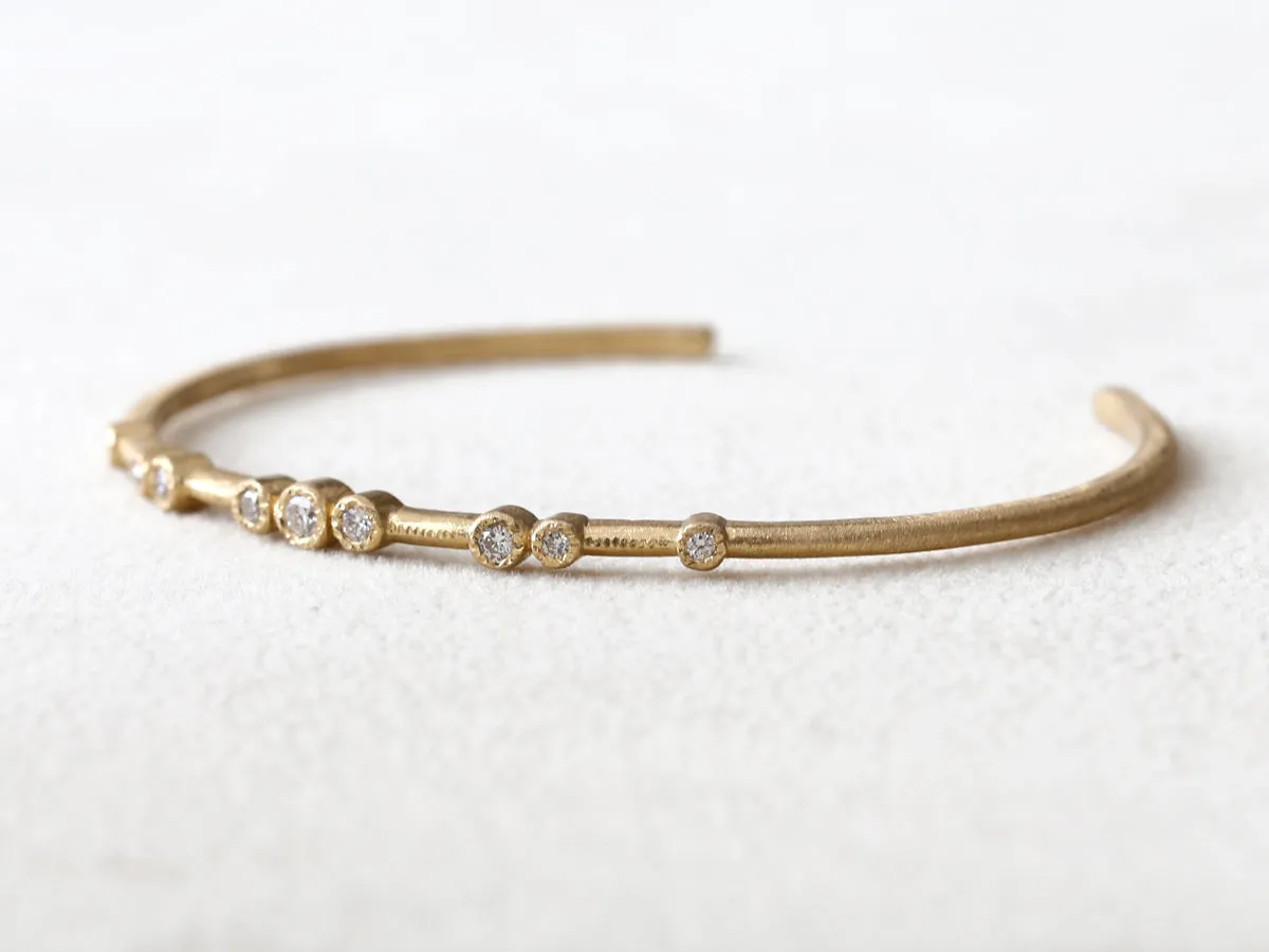 18ky 9-bezel cuff bracelet