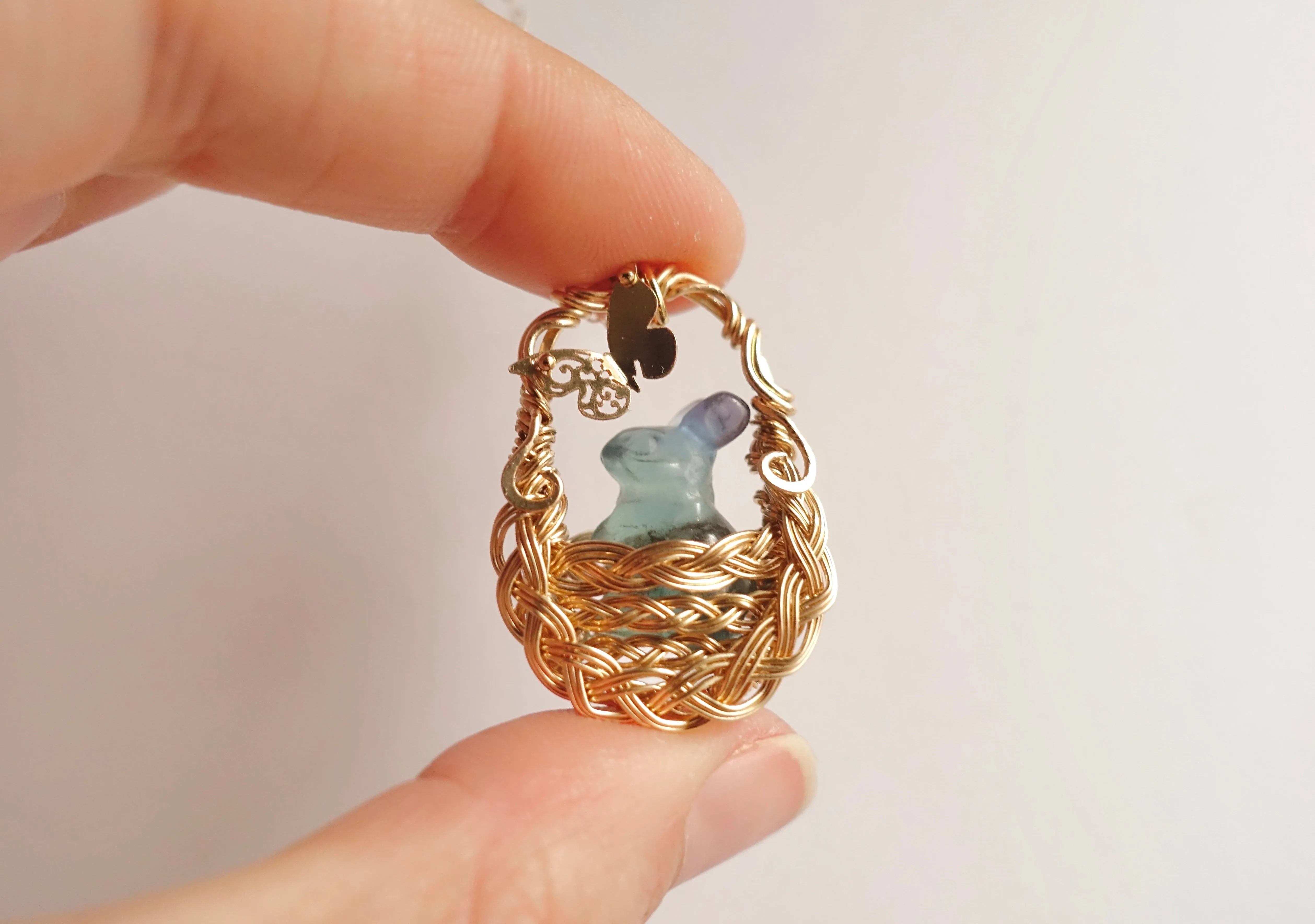Fluorite Bunny in Gold Woven Basket