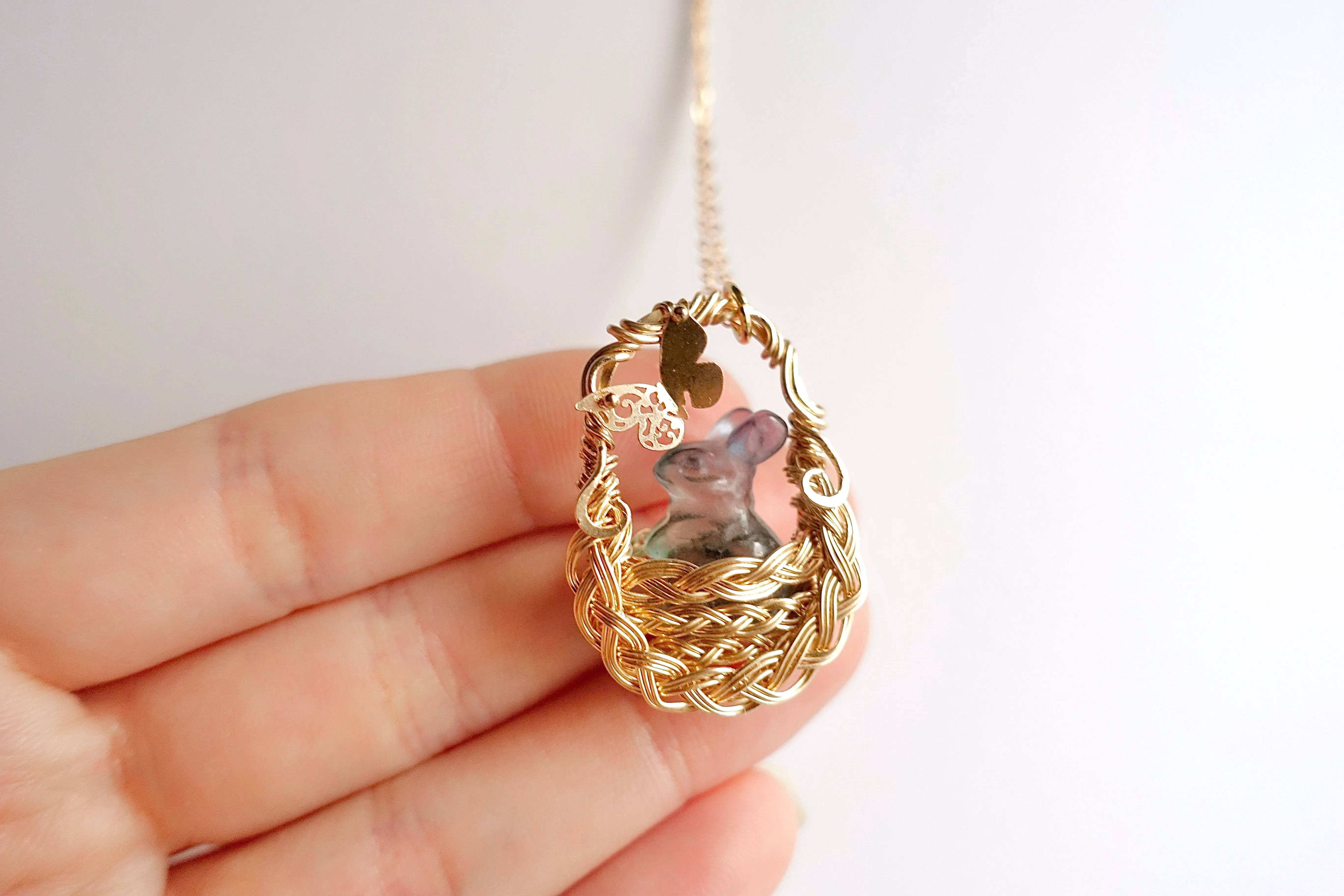 Fluorite Bunny in Gold Woven Basket