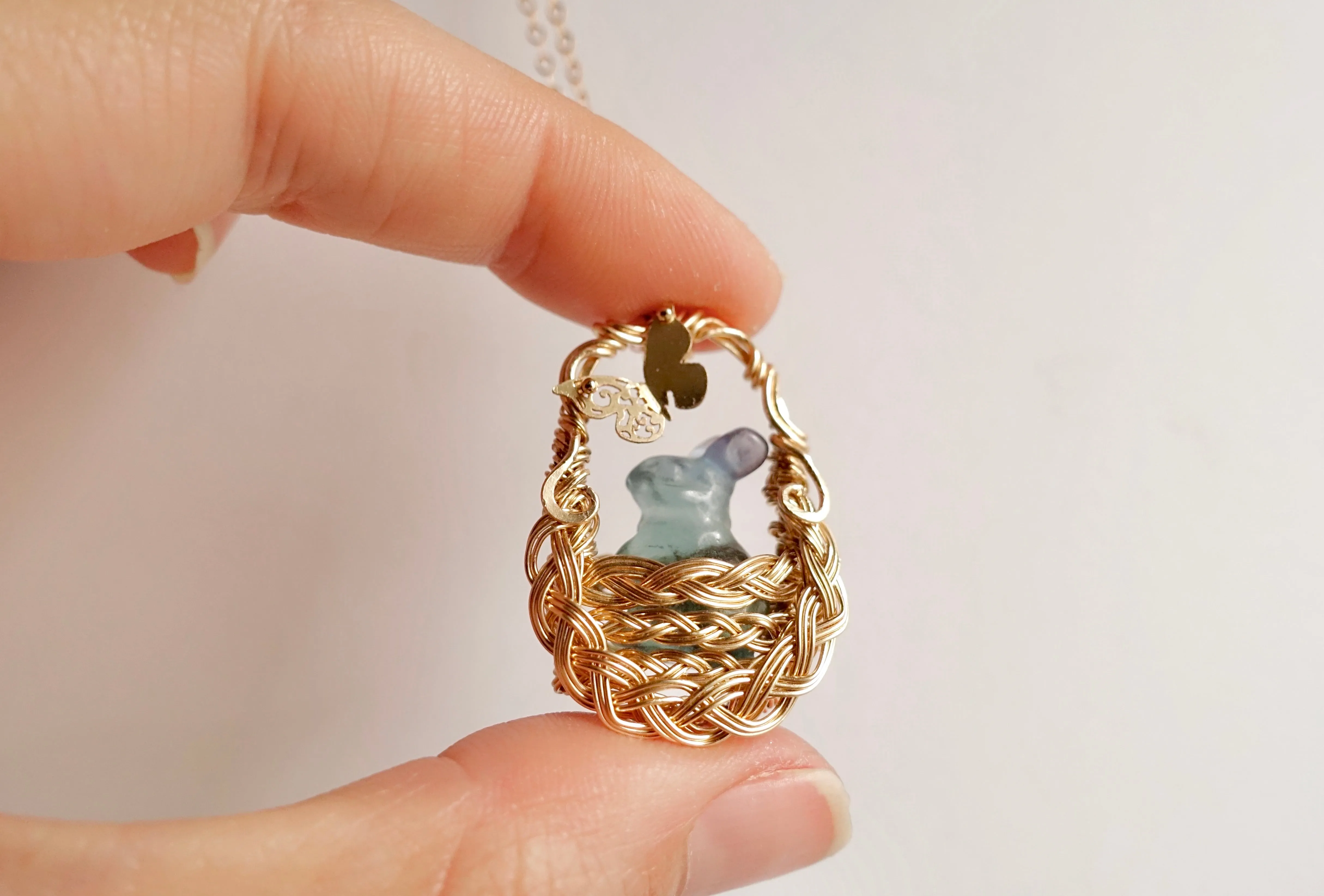 Fluorite Bunny in Gold Woven Basket