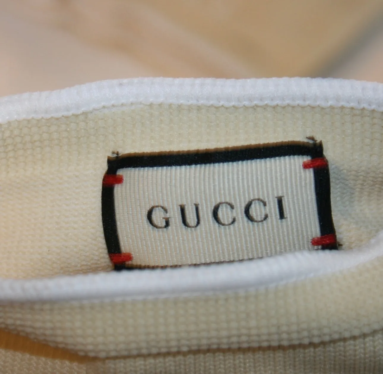 Gucci Ivory GG Logo Knee Pads