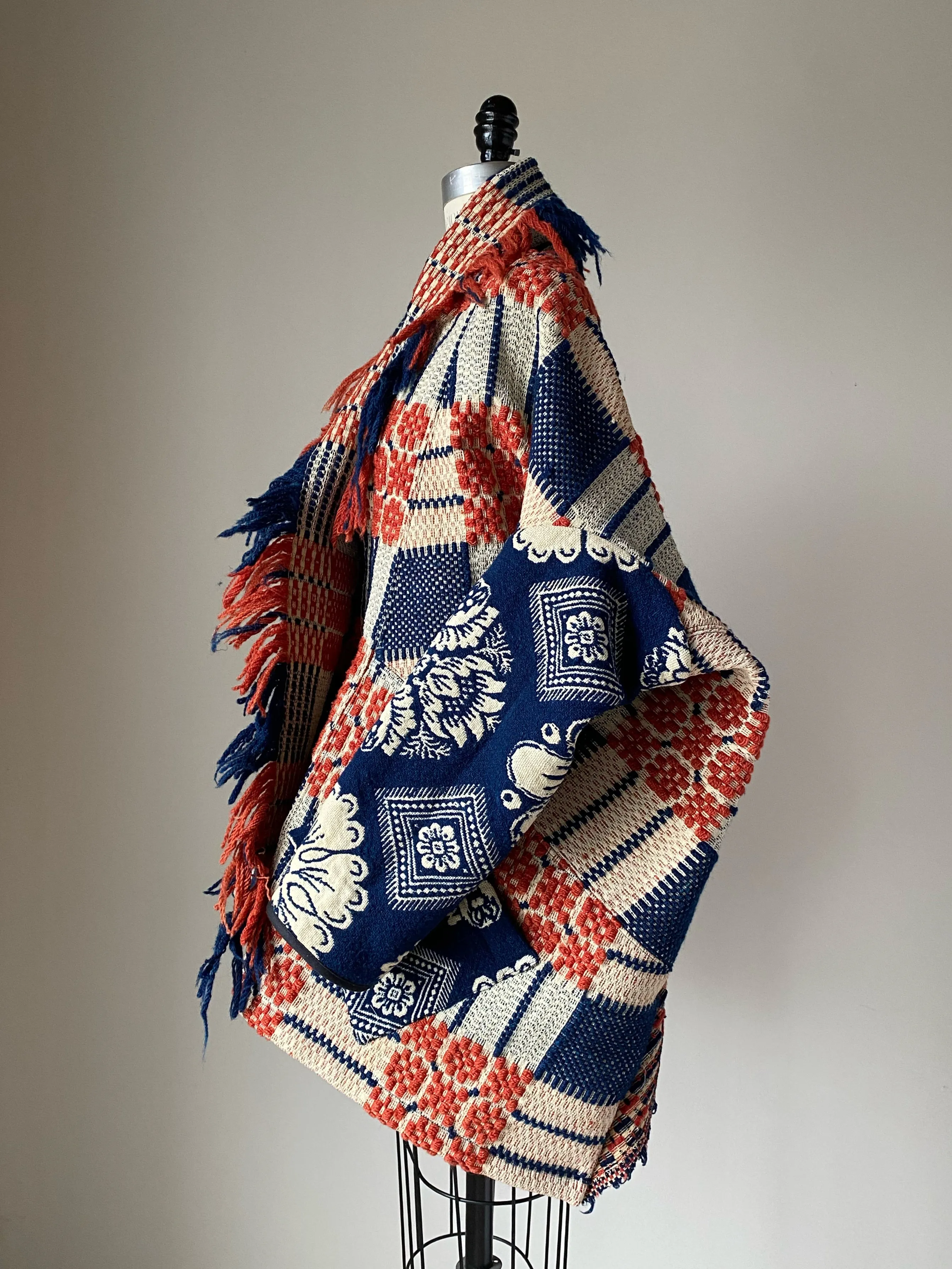overshot coverlet cocoon with floral coverlet sleeves