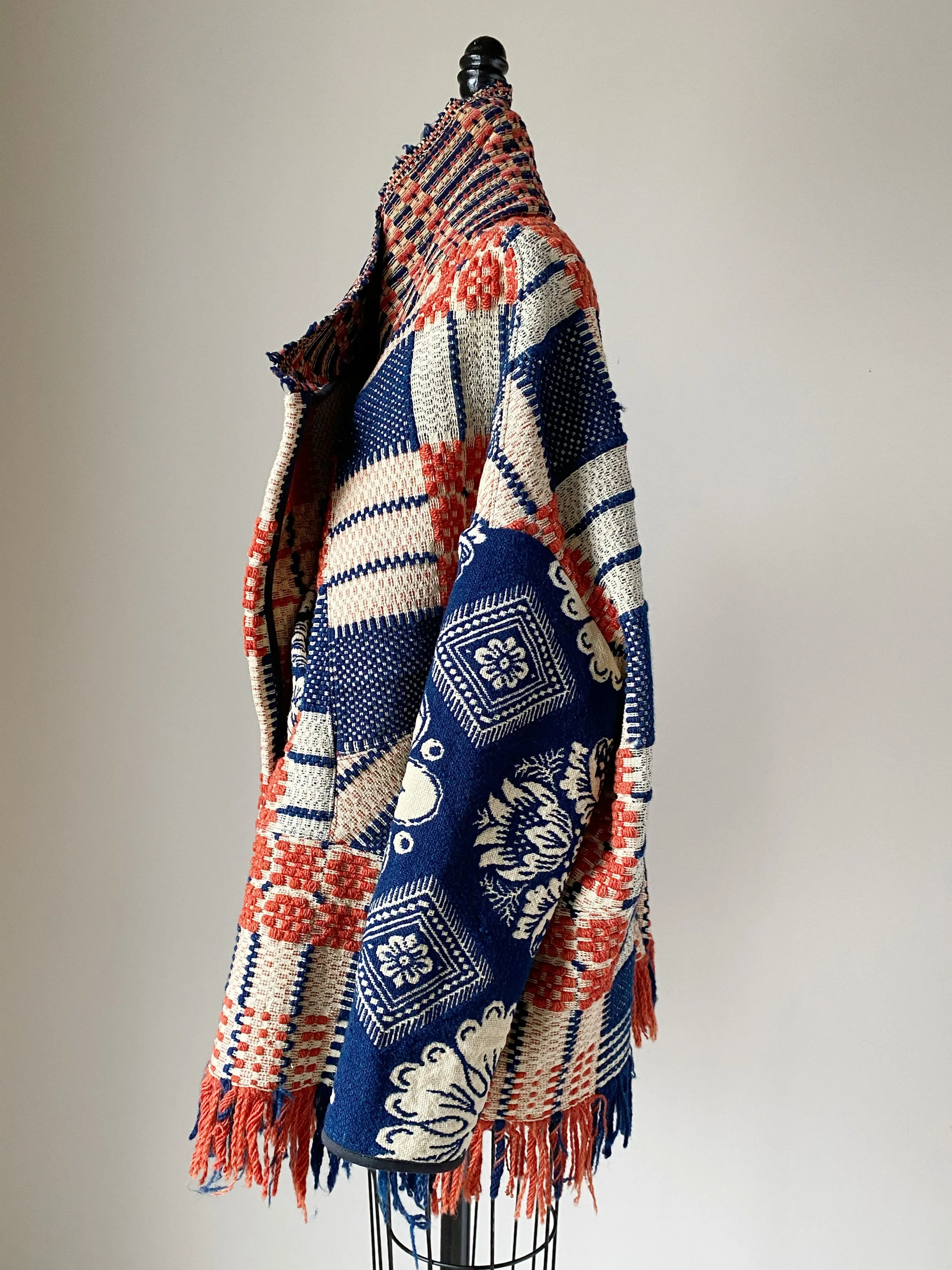 overshot coverlet cocoon with floral coverlet sleeves