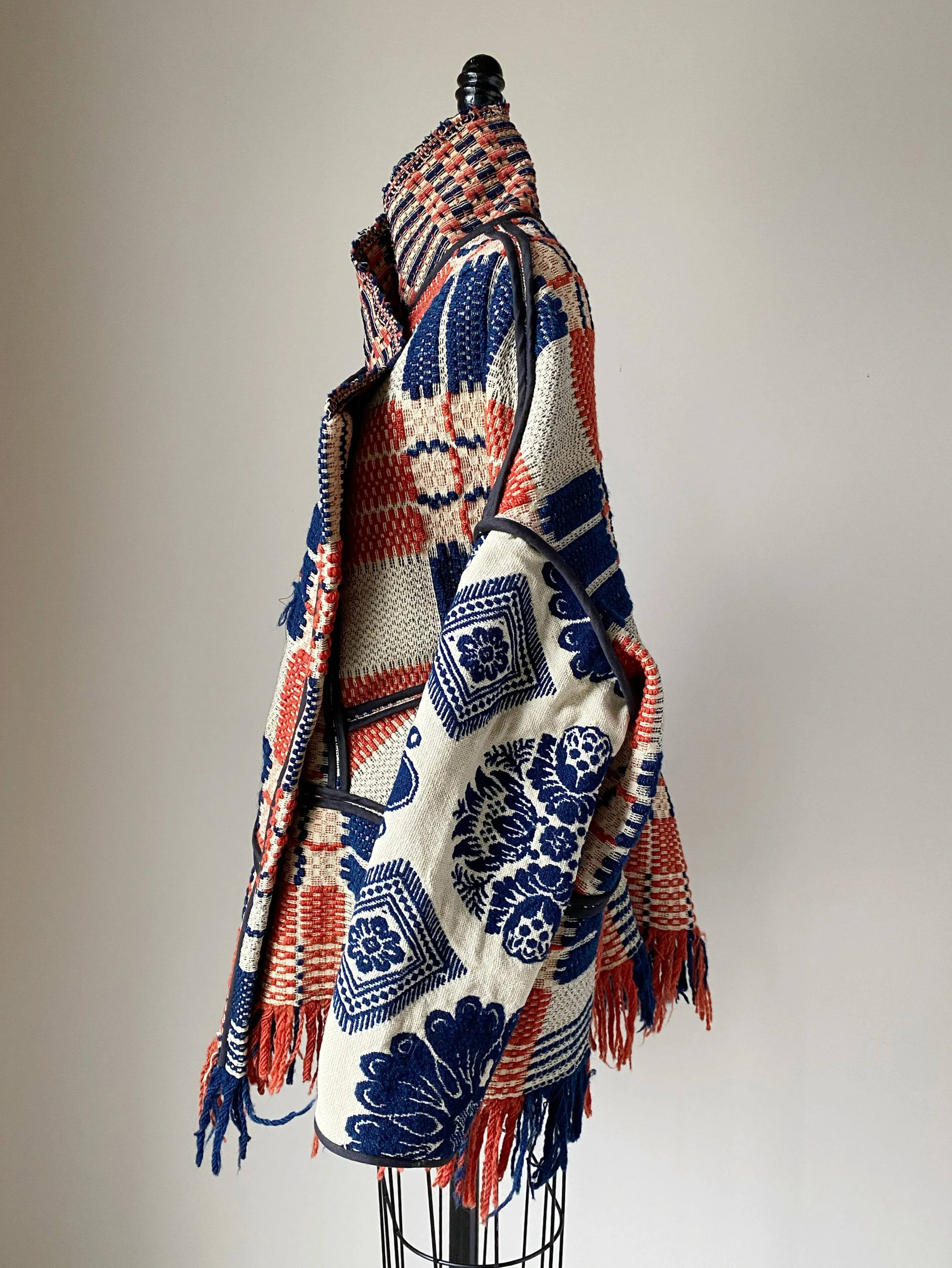 overshot coverlet cocoon with floral coverlet sleeves