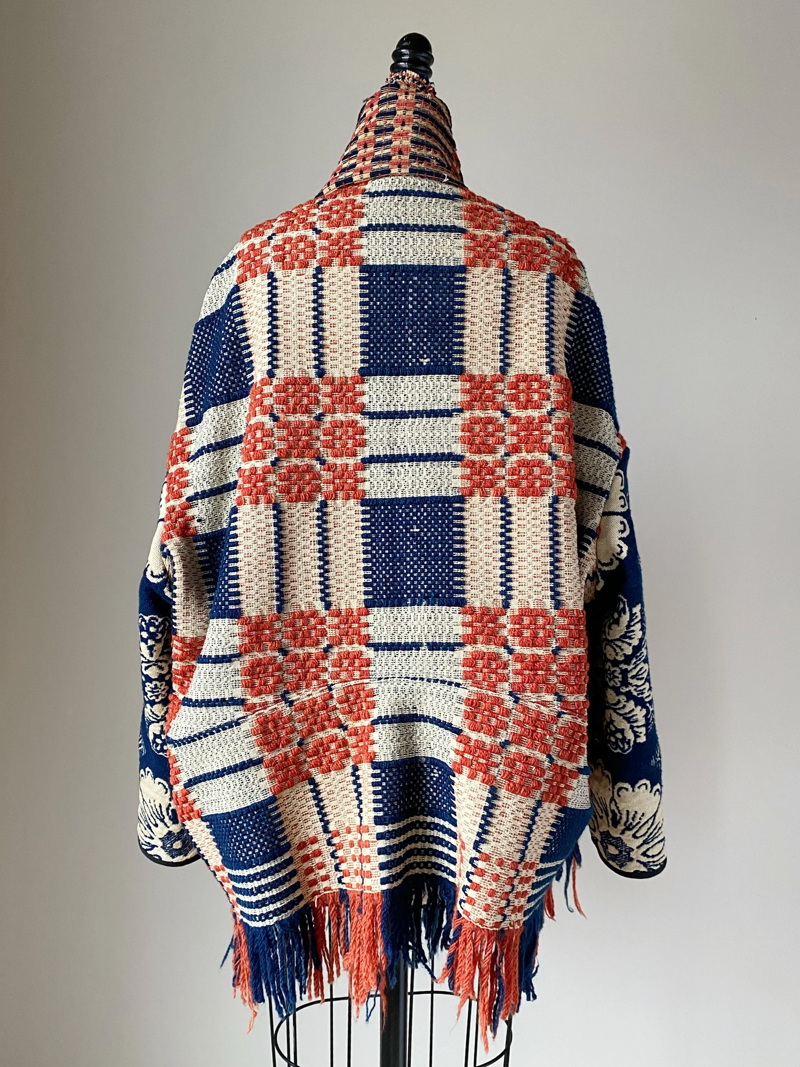 overshot coverlet cocoon with floral coverlet sleeves