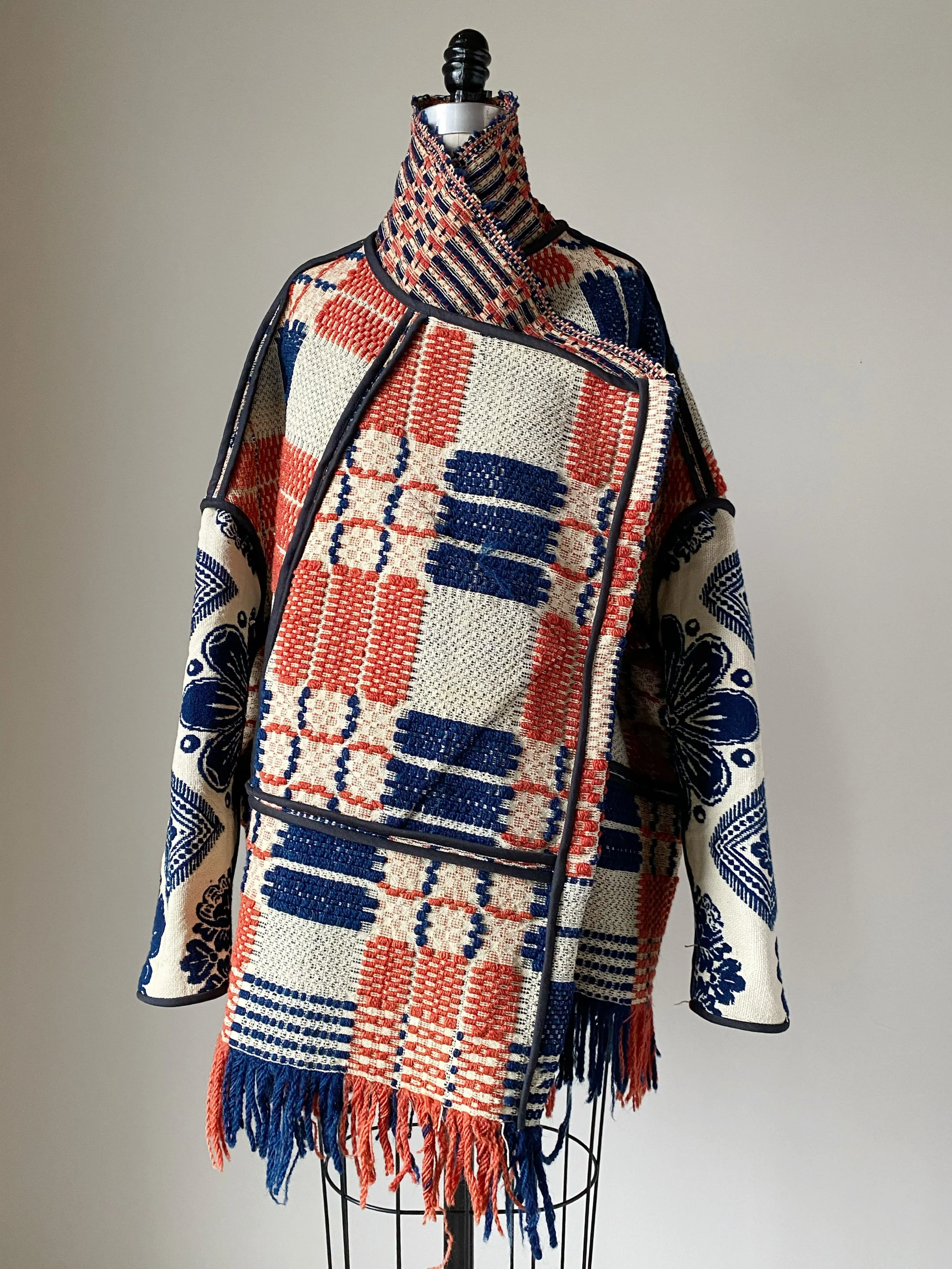 overshot coverlet cocoon with floral coverlet sleeves